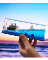 Titanic Ship in a Liquid Wave